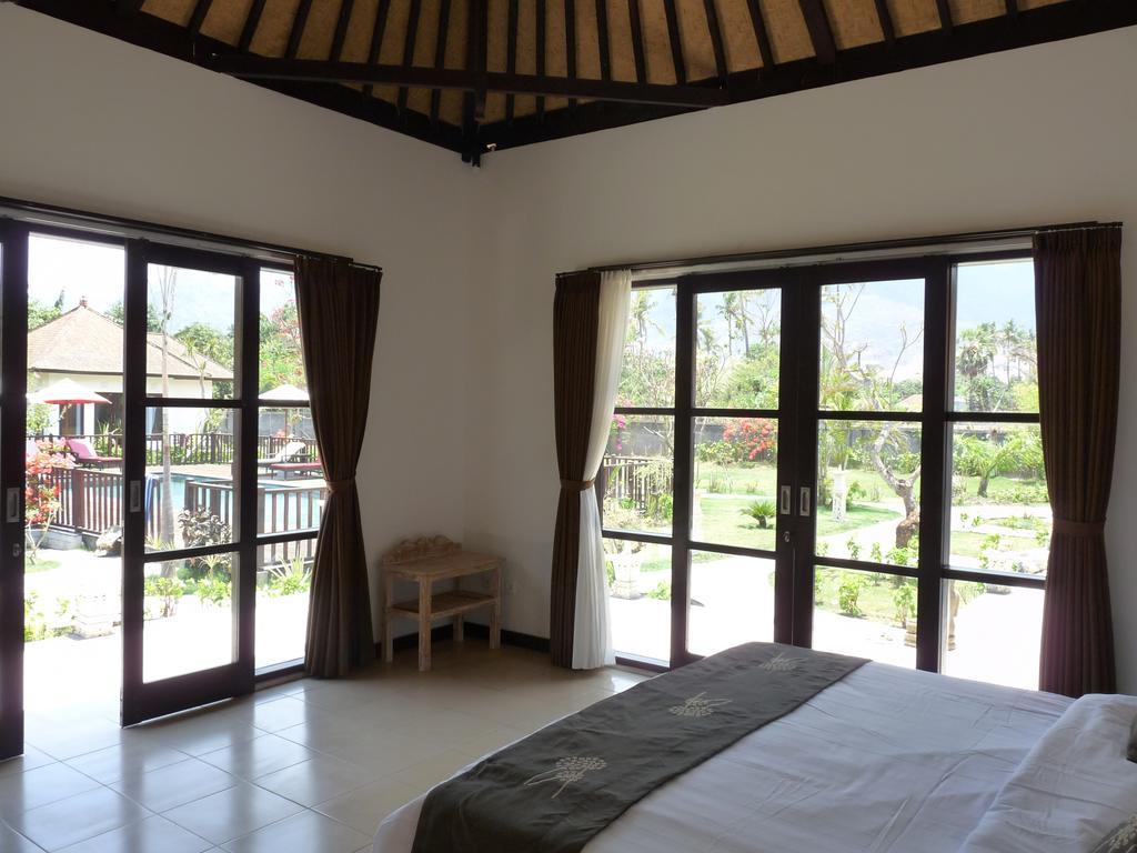 Taman Dewi Sri Villa Et Bungalow Pemuteran Habitación foto